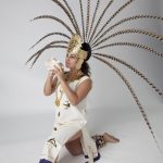Lorena in "conchero" costume, playing the "Concha" horn